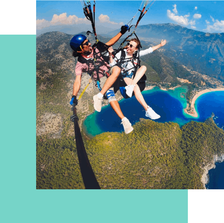 2 personne en train de faire du parapente